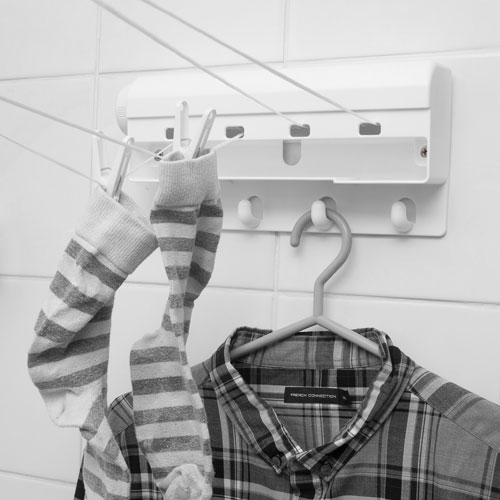 Caraselle Clip Hangers Indoor Retractable Clothes Line by Minky.