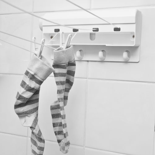 Caraselle Clip Hangers Indoor Retractable Clothes Line by Minky.